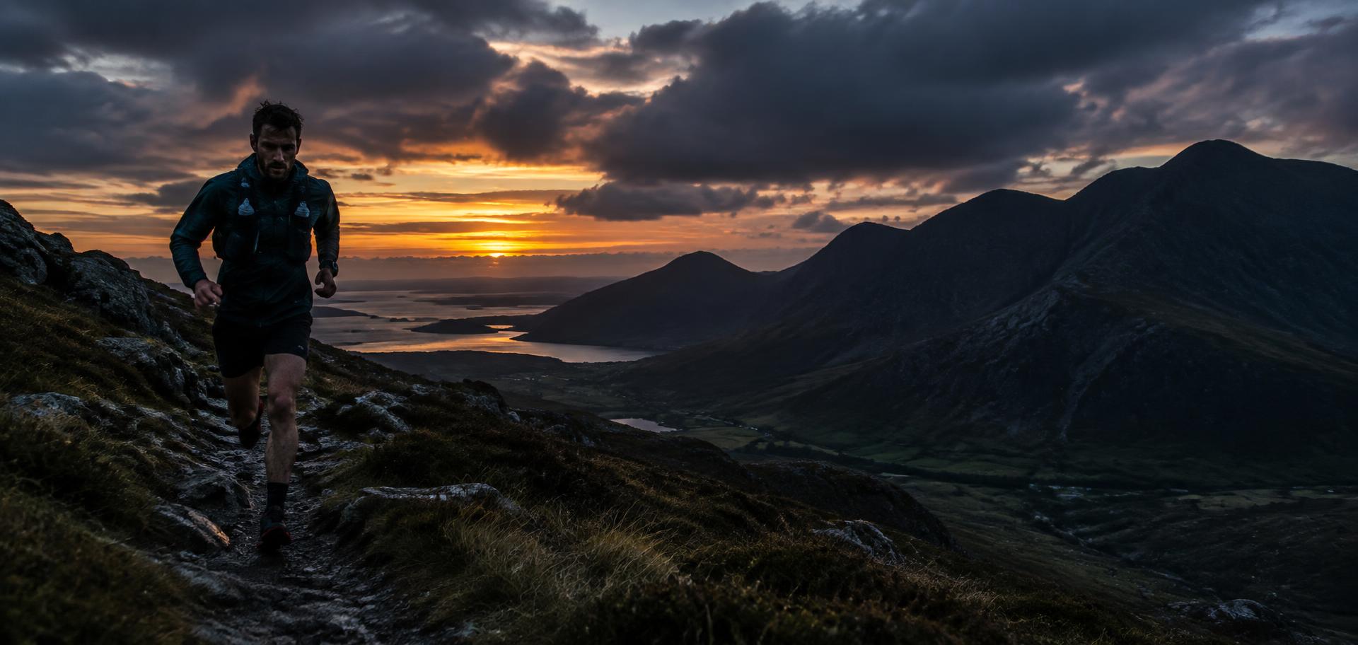 Trail runner on a Kerry mountain path at dusk